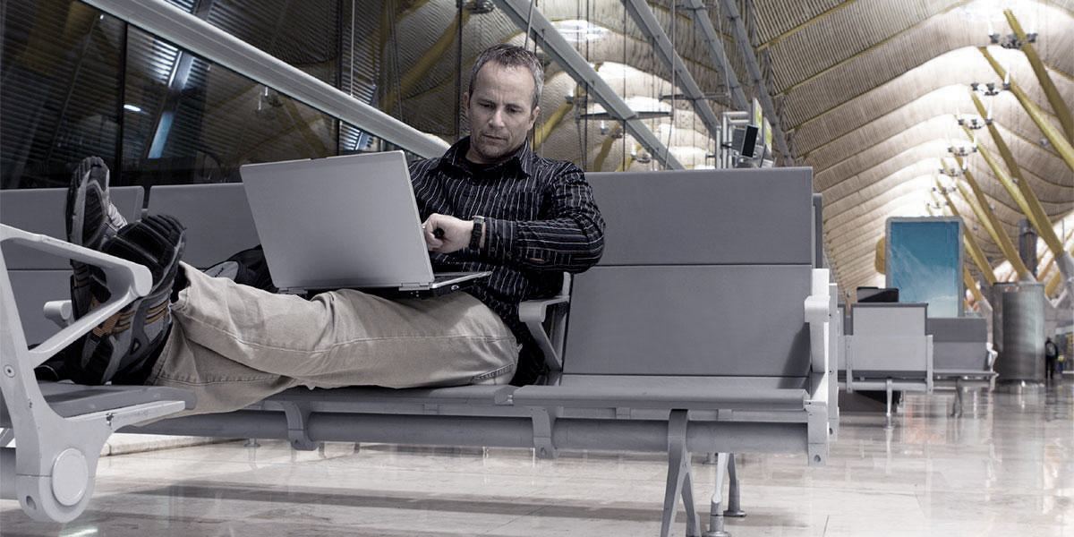 person-with-laptop-in-airport-3.jpg